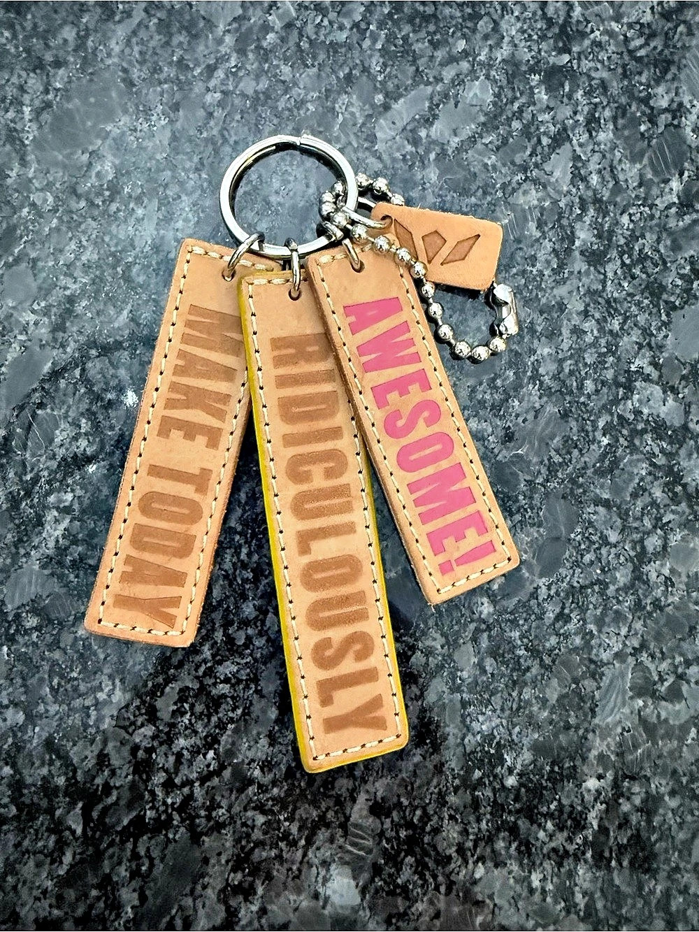 Consuela Mantra Charm Keychain Orange & Pink